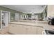 Open kitchen with breakfast bar offering great views into the dining and living areas at 4895 Luster Leaf Circle # 304, Myrtle Beach, SC 29577