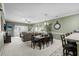 Relaxing living room and dining area that connects to the kitchen in an open floor plan at 4895 Luster Leaf Circle # 304, Myrtle Beach, SC 29577