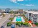 Aerial view of property featuring the pool, well-maintained landscaping, and coastal surroundings at 5001 N Ocean Blvd. # 1F, North Myrtle Beach, SC 29582