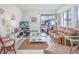 Bright living space with comfortable furniture, balcony access, and pleasant decor for easy living at 5001 N Ocean Blvd. # 1F, North Myrtle Beach, SC 29582