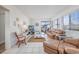 Inviting living room with comfortable furniture, TV, and balcony access, perfect for relaxation at 5001 N Ocean Blvd. # 1F, North Myrtle Beach, SC 29582