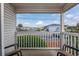 Inviting porch offers peaceful views of the neighborhood and waterway at 5001 N Ocean Blvd. # 1F, North Myrtle Beach, SC 29582