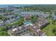Aerial view of condo community featuring a pool, lagoon and golf course near the ocean at 501 Maison Dr. # G-7, Myrtle Beach, SC 29572