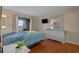 Comfortable bedroom featuring a spacious bed, dresser, and sliding glass doors with marsh view at 501 Maison Dr. # G-7, Myrtle Beach, SC 29572