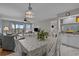 Open-concept dining space connecting the living room and kitchen areas at 501 Maison Dr. # G-7, Myrtle Beach, SC 29572