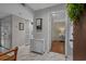 Bright entryway with marble floors, stylish storage, and open doorway leading to living spaces at 501 Maison Dr. # G-7, Myrtle Beach, SC 29572