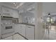 Well-lit kitchen with view to living and dining area at 501 Maison Dr. # G-7, Myrtle Beach, SC 29572