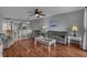 Comfortable living room featuring hardwood floors and access to the dining area at 501 Maison Dr. # G-7, Myrtle Beach, SC 29572