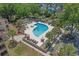 Community pool and hot tub area with lounge chairs and well-maintained landscaping at 501 Maison Dr. # G-7, Myrtle Beach, SC 29572