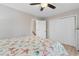 Bright bedroom featuring a ceiling fan, double closet, and nautical bedding at 507-C 2Nd Ave. N, North Myrtle Beach, SC 29582