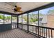 Relaxing screened deck overlooking neighborhood and mature trees at 507-C 2Nd Ave. N, North Myrtle Beach, SC 29582