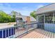 Spacious deck featuring wooden rails with views of neighboring homes at 507-C 2Nd Ave. N, North Myrtle Beach, SC 29582