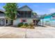 Charming two-story home with screened porch, landscaped yard, and convenient carport at 507-C 2Nd Ave. N, North Myrtle Beach, SC 29582