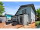 Rear exterior view of home showing deck and sunroom at 507-C 2Nd Ave. N, North Myrtle Beach, SC 29582