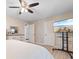 Bright primary bedroom with a ceiling fan, dresser and a wall-mounted TV at 507-C 2Nd Ave. N, North Myrtle Beach, SC 29582