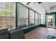 Cozy sun room featuring lots of natural light, and a brick paver floor at 507-C 2Nd Ave. N, North Myrtle Beach, SC 29582