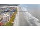 Stunning aerial panorama of the coastline, highlighting the property's ideal beach location at 5800 N Ocean Blvd. # 405, North Myrtle Beach, SC 29582