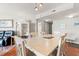 Cozy dining room with seating for six, next to a comfortable sitting area, providing ample space for relaxation at 5800 N Ocean Blvd. # 405, North Myrtle Beach, SC 29582
