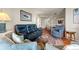 Cozy living room with dining area in view, comfortable seating, and a warm atmosphere at 5800 N Ocean Blvd. # 405, North Myrtle Beach, SC 29582