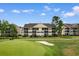Aerial view of condo community along golf course showcasing the location and surrounding greenery at 5840 Longwood Dr. # 303, Murrells Inlet, SC 29576