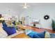 Spacious living room featuring hardwood floors, comfortable seating, open layout, and modern amenities at 5840 Longwood Dr. # 303, Murrells Inlet, SC 29576