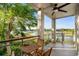 Beautiful porch view with chairs, table, overlooking the water at 600 48Th Ave. S # 201, North Myrtle Beach, SC 29582