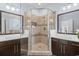 Bright bathroom featuring a large walk-in shower with mosaic tile accents and dual vanities at 600 48Th Ave. S # 201, North Myrtle Beach, SC 29582