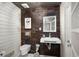 Stylish half bath features unique wood accents, modern fixtures, and a sleek design at 600 48Th Ave. S # 201, North Myrtle Beach, SC 29582