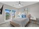 Charming bedroom features a comfy bed and a large window with picturesque outdoor views at 600 48Th Ave. S # 201, North Myrtle Beach, SC 29582