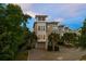Charming exterior of the home, complemented by lush landscaping and a private drive at 600 48Th Ave. S # 201, North Myrtle Beach, SC 29582