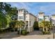 Charming coastal home with private entrance and manicured landscaping and beautiful architectural design at 600 48Th Ave. S # 201, North Myrtle Beach, SC 29582