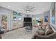 Open and airy living room with lots of natural light, hardwood floors, modern decor and comfortable seating at 600 48Th Ave. S # 201, North Myrtle Beach, SC 29582