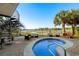 Relaxing outdoor pool area with lounge seating and beautiful water views at 600 48Th Ave. S # 201, North Myrtle Beach, SC 29582