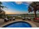 Relaxing pool area with comfortable seating and beautiful waterway views at 600 48Th Ave. S # 201, North Myrtle Beach, SC 29582