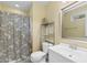 Functional bathroom with a shower, toilet, and a single sink vanity at 6001 South Kings Hwy., Myrtle Beach, SC 29575