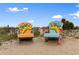Fun, colorful beach chairs with star designs on sandy beach under a sunny sky; relax and enjoy the view at 6001 South Kings Hwy., Myrtle Beach, SC 29575