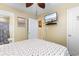 Comfortable bedroom with a TV and easy access to an adjacent bathroom at 6001 South Kings Hwy., Myrtle Beach, SC 29575