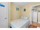 Bedroom with a full bed and access to another room with appliances at 6001 South Kings Hwy., Myrtle Beach, SC 29575