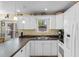 Bright kitchen featuring white cabinetry, modern appliances, and ample counter space for cooking and entertaining at 6001 South Kings Hwy., Myrtle Beach, SC 29575