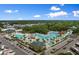 Aerial view of a waterpark featuring pools and slides, surrounded by neighborhood at 6001 South Kings Hwy., Myrtle Beach, SC 29575