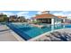 Beautiful community pool with a swim-up bar and ample space for lounging and relaxation at 6043 Forest Dell Ct, Myrtle Beach, SC 29579
