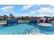 Inviting community pool with a waterfall feature and lush landscaping at 6043 Forest Dell Ct, Myrtle Beach, SC 29579