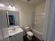 Bright bathroom with a tub-shower combo, a sleek sink and vanity, and modern fixtures at 630 Muster Field Ct., Conway, SC 29526