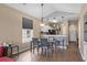 Charming dining area with elegant lighting and seamless flow into the kitchen and living space at 650 River Oaks Dr. # 46I, Myrtle Beach, SC 29579
