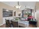 Cozy dining area that opens up to the living room with lots of natural light at 650 River Oaks Dr. # 46I, Myrtle Beach, SC 29579