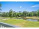 Enjoy the scenic golf course views from the private porch at 650 River Oaks Dr. # 46I, Myrtle Beach, SC 29579