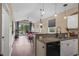 Gourmet kitchen featuring granite countertops and an open design to the living area at 650 River Oaks Dr. # 46I, Myrtle Beach, SC 29579