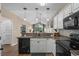 Open kitchen with granite counters, breakfast bar and stainless appliances is perfect for entertaining at 650 River Oaks Dr. # 46I, Myrtle Beach, SC 29579