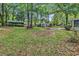 Expansive backyard with lush greenery and ample space at 715 9Th Ave. S, Surfside Beach, SC 29575