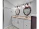Bathroom with shower stall and updated dual sink vanity at 715 9Th Ave. S, Surfside Beach, SC 29575
